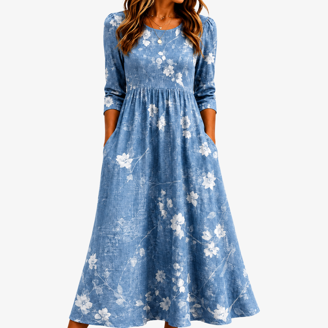 Abito midi azzurro con stampa floreale e tasche laterali