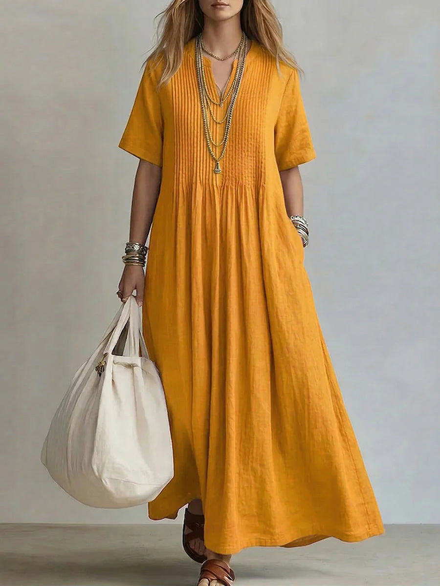 Abito maxi boho in lino ocra con scollo a V e plissé - Bella di Roma