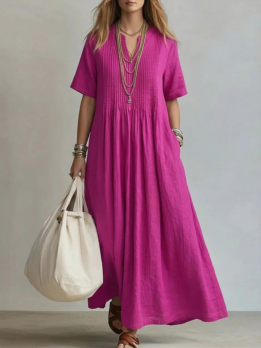 Abito maxi boho in lino fucsia con scollo a V e plissé - Bella di Roma