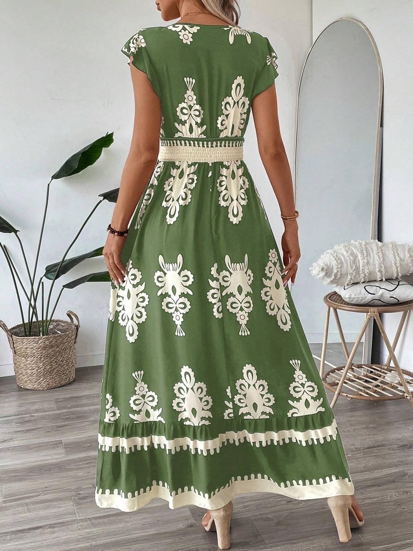 Vestito maxi verde con ricamo etnico e gonna a balze