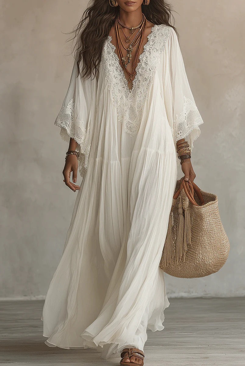 Abito maxi boho con maniche larghe e ricami - colore bianco | Bella di Roma