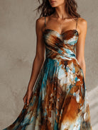 Abito lungo ambra in chiffon con caduta fluida