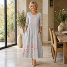 Abito midi grigio perla con stampa floreale chiara