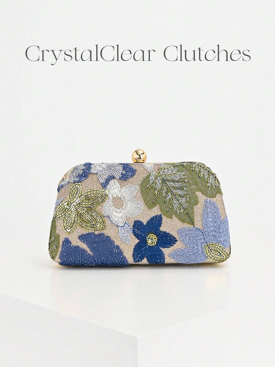 Pochette a mezzaluna con fiori blu e verdi e catena dorata