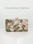 Clutch rigida con fiori bianchi e foglie verdi e catena dorata