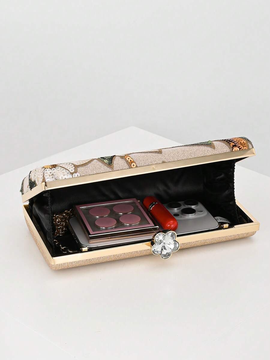 Clutch con fiori bianchi e foglie verdi, vista frontale