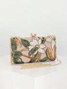 Montatura dorata con chiusura a scatto della clutch avorio