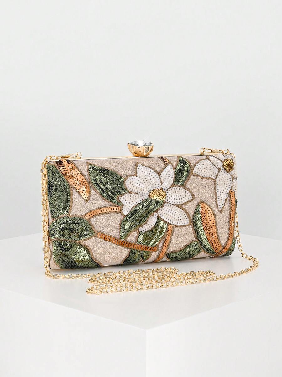 Montatura dorata con chiusura a scatto della clutch avorio