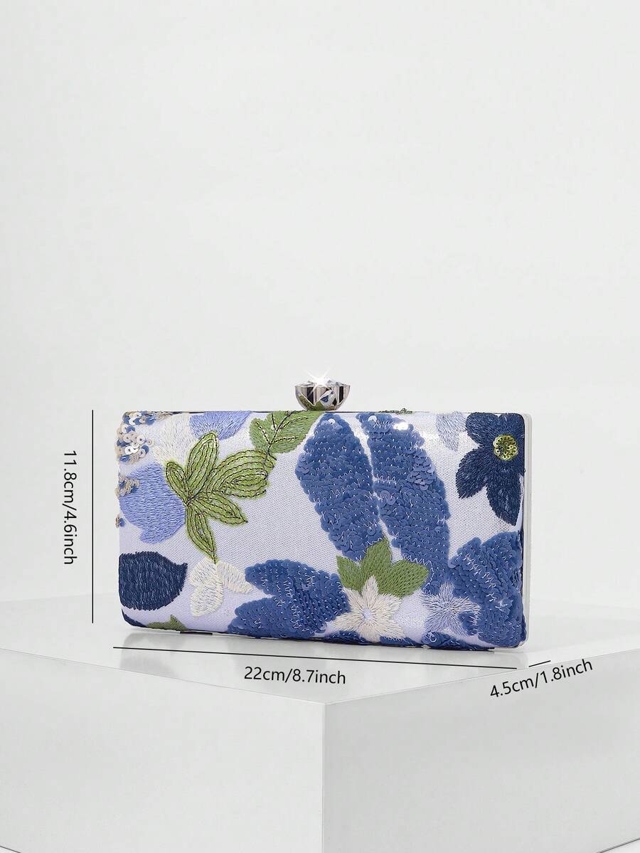 Clutch rigida con fiori blu, vista laterale
