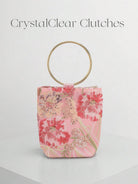 Mini borsa in broccato floreale rosa con manico ad anello dorato