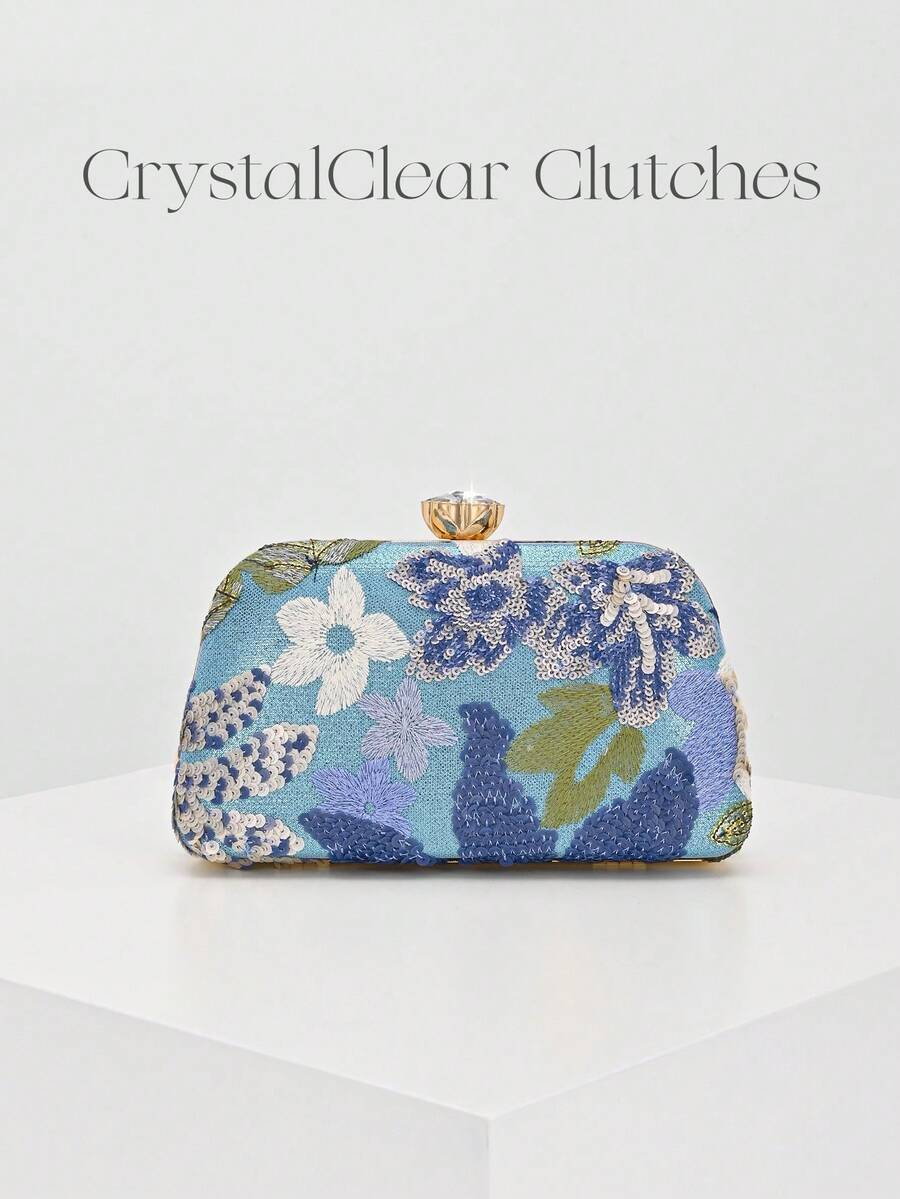 Pochette a mezzaluna con fantasia floreale blu e lilla e catena dorata