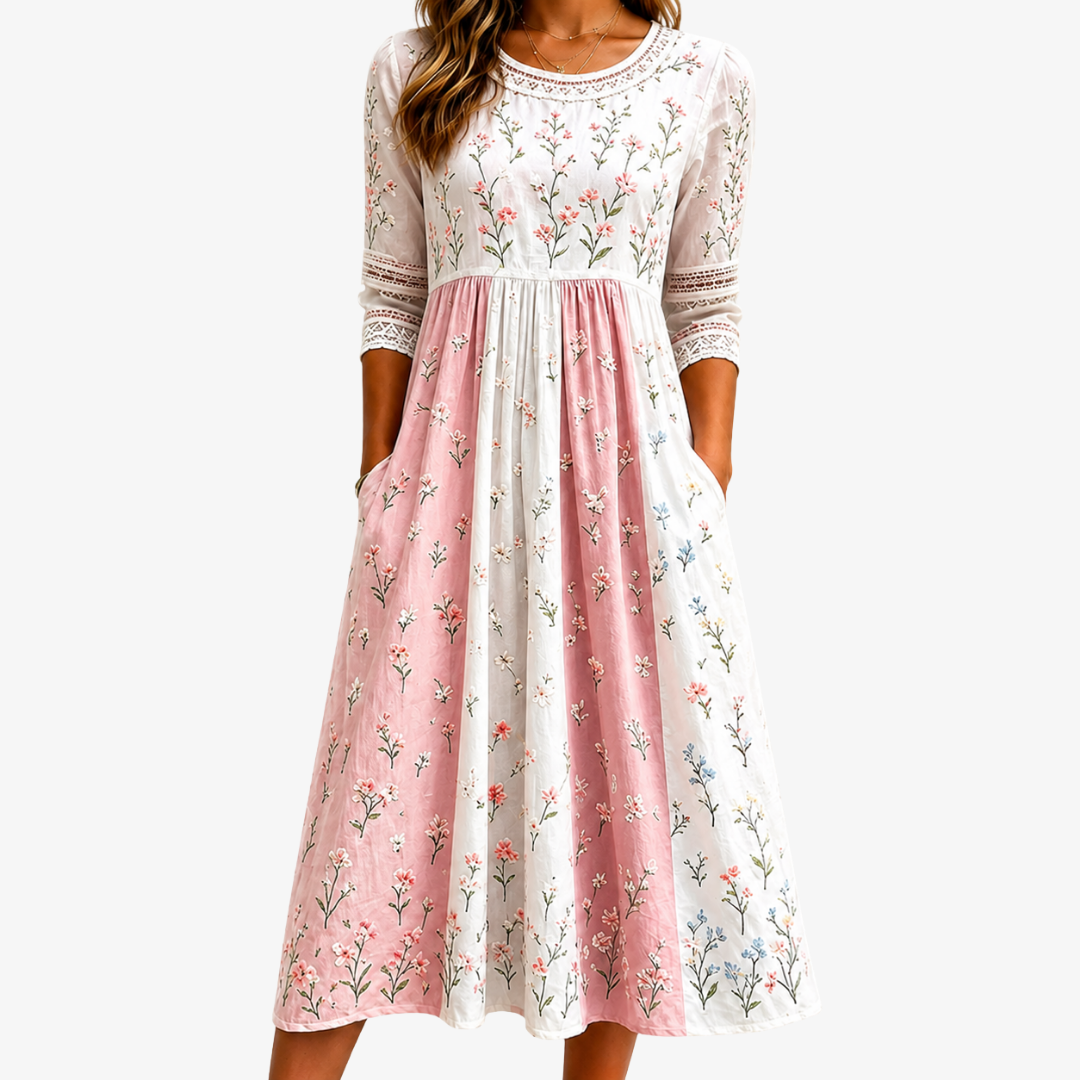 Abito midi con patchwork di stampe floreali rosate e tasche laterali