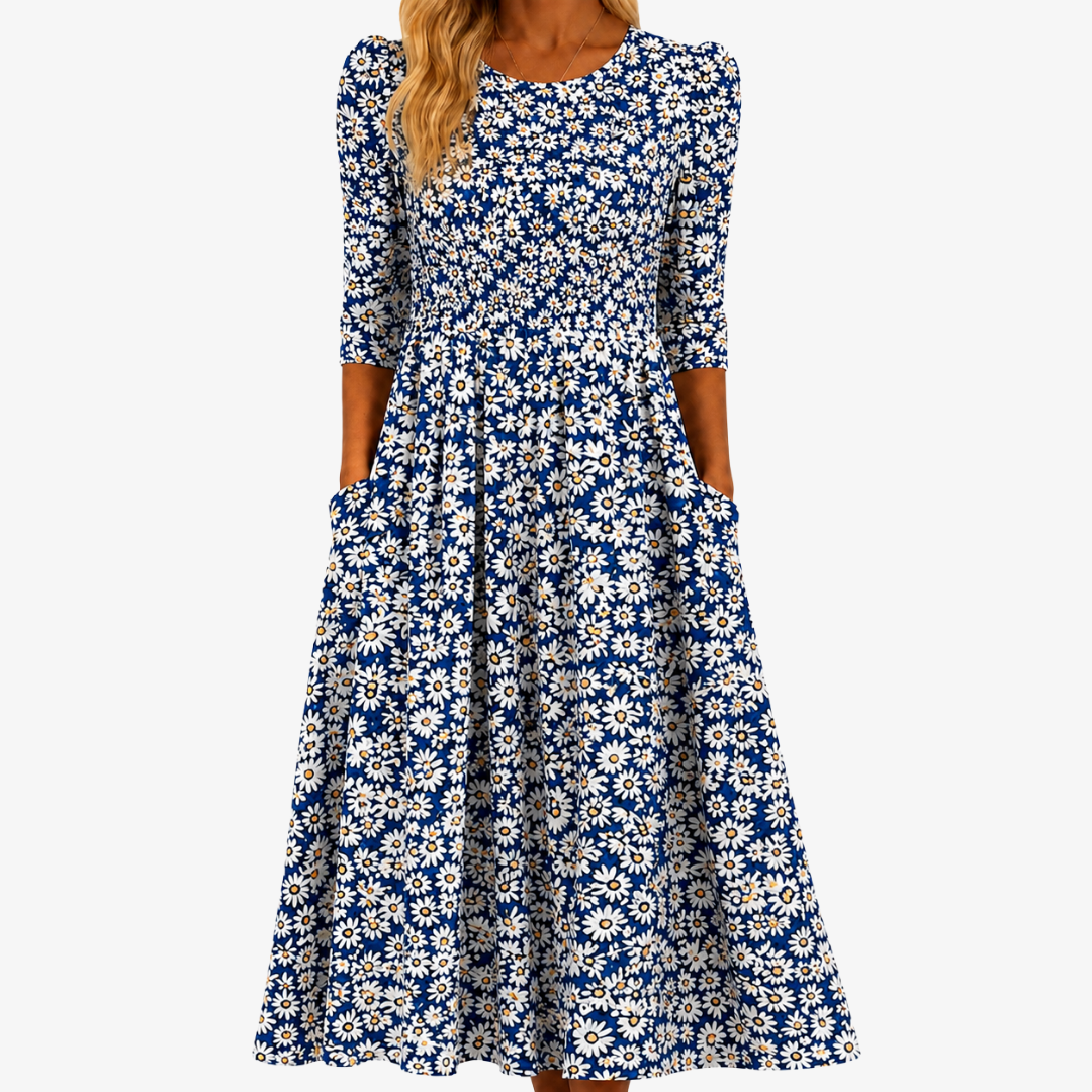 Abito maxi blu con stampa a margherite e tasche laterali