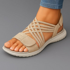 Sandali comfort da donna in tonalità neutra con intreccio elastico e suola flessibile