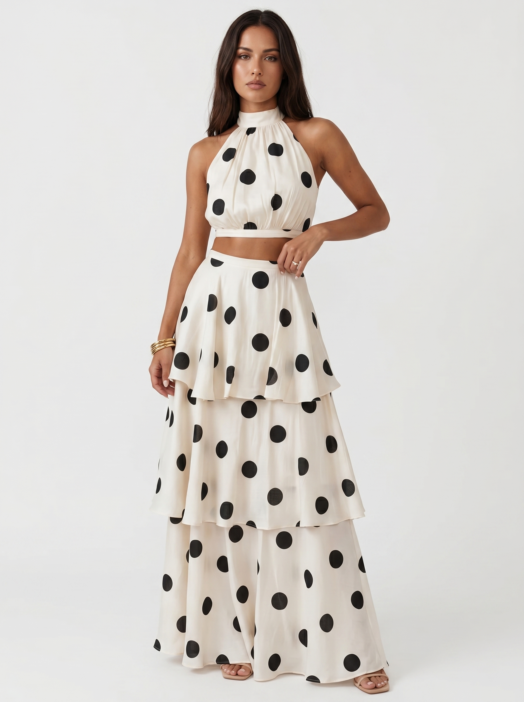 Completo due pezzi a pois Lucía avorio con top halter e gonna lunga a balze | Bella di Roma