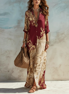 Vestito maxi con stampa paisley bordeaux, scollo a V e manica lunga