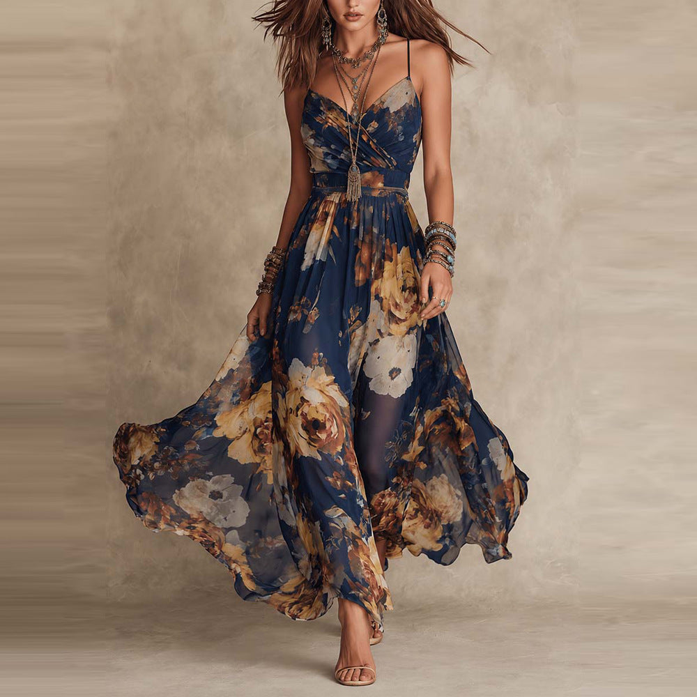 Vestito lungo floreale Ginevra in blu notte con spalline sottili e stampa a fiori nei toni del pesca
