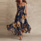 Vestito lungo floreale Ginevra in blu notte con spalline sottili e stampa a fiori nei toni del pesca