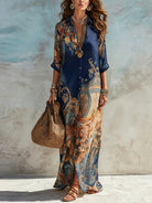 Vestito maxi con stampa paisley blu, scollo a V e manica lunga