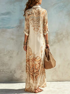 Vestito maxi con stampa paisley panna, scollo a V e manica lunga