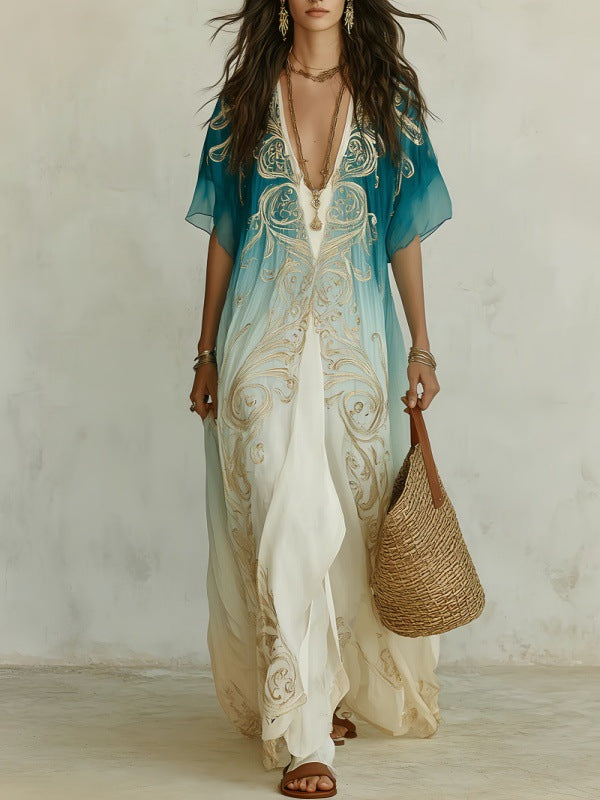 Abito maxi boho sfumatura azzurra con maniche ampie e ricami etnici - Bella di Roma