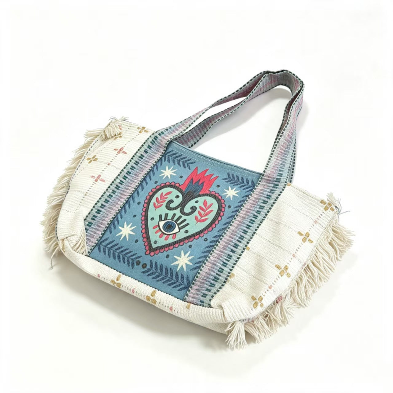 Borsa tote in tela azzurra con medaglione ricamato e volant