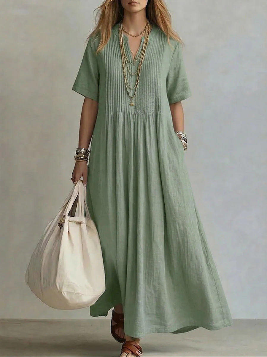 Abito maxi boho in lino verde salvia con scollo a V e plissé - Bella di Roma