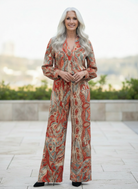 Completo due pezzi in fantasia paisley ruggine con camicia e pantaloni a gamba larga
