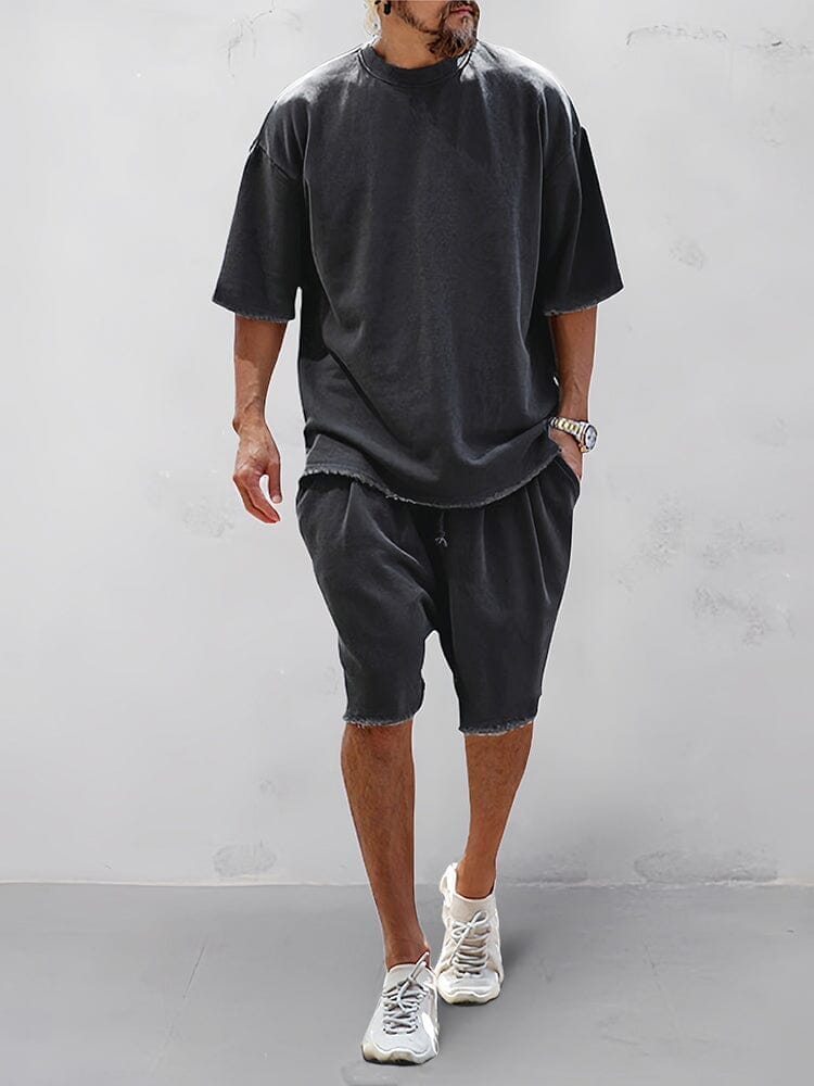 Set sportivo uomo nero in cotone – t-shirt e shorts | Bella di Roma