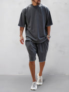 Set sportivo uomo grigio scuro in cotone – t-shirt e shorts | Bella di Roma