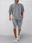 Set sportivo uomo grigio chiaro in cotone – t-shirt e shorts | Bella di Roma
