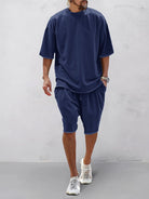 Set sportivo uomo blu navy in cotone – t-shirt e shorts | Bella di Roma
