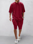 Set sportivo uomo rosso in cotone – t-shirt e shorts | Bella di Roma