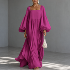 Abito lungo fucsia con scollo quadrato e maniche a sbuffo
