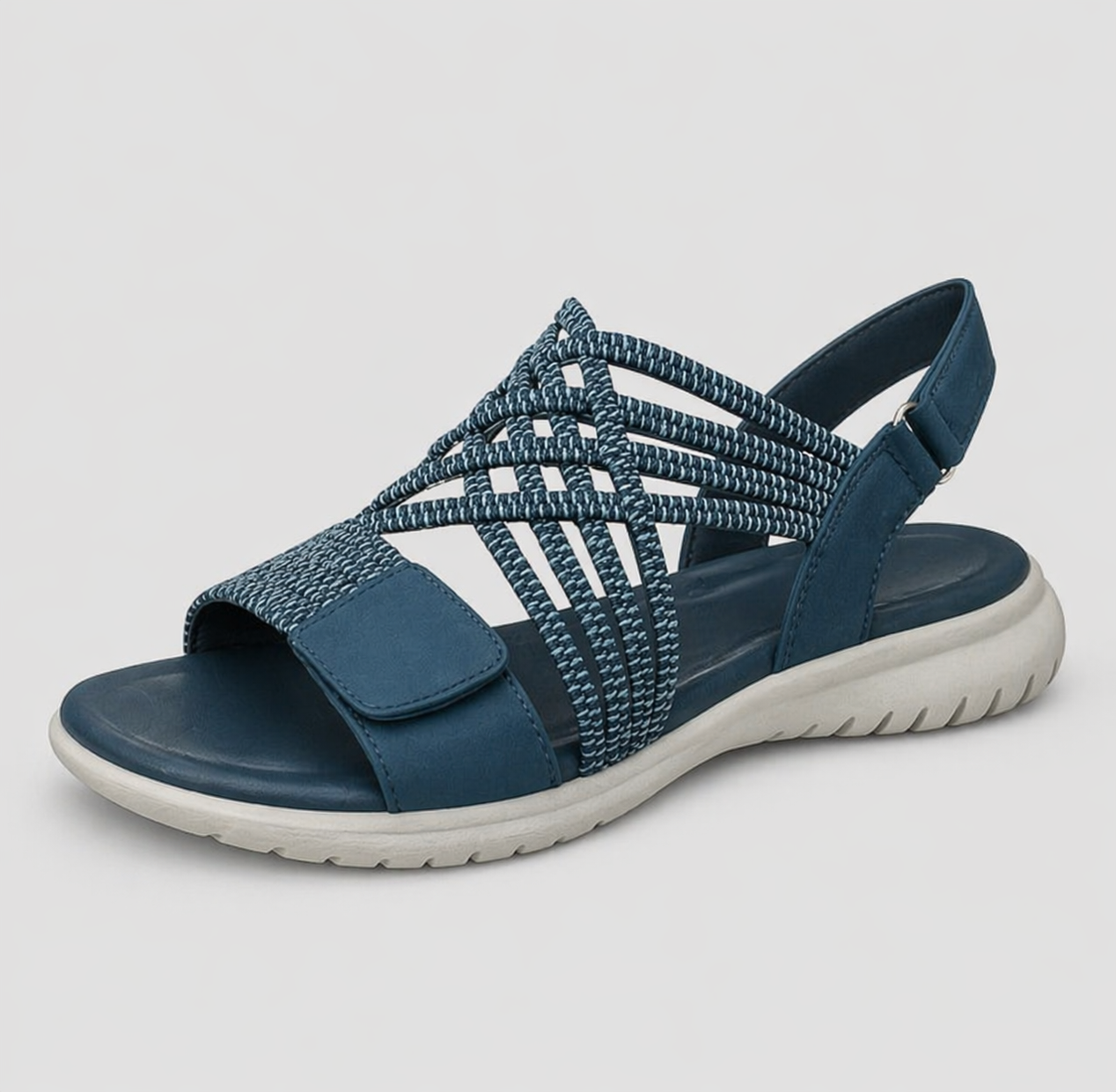 Sandali comfort da donna in blu visti di lato, con cinturino posteriore regolabile e suola antiscivolo